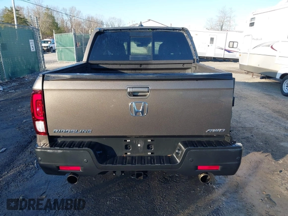 2022 Honda Ridgeline RTL-E with VIN 5FPYK3F79NB005152, listed as a IAAI auction lot 41754891 with 60,191 mi miles and . Bid and sale history available at DreamBid. Image 17.