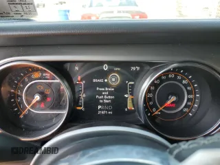 2022 Jeep Wrangler Unlimited Sahara with VIN 1C4HJXENXNW244773, listed as a Copart auction lot 59694095 with 21,871 mi miles and Salvage title. Bid and sale history available at DreamBid. Image 9.