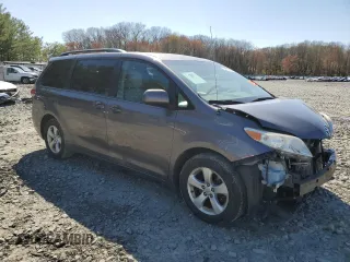 2014 Toyota Sienna LE AAS with VIN 5TDKK3DC6ES511466, listed as a Copart auction lot 52517555 with 142,744 mi miles and Salvage Title. Bid and sale history available at DreamBid. Image 4.