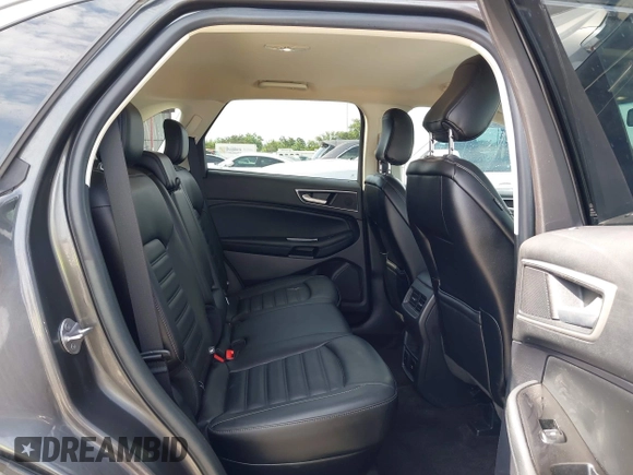 2020 Ford Edge SEL z VIN 2FMPK3J9XLBA54556, wystawiony jako IAAI lot #42179907 z przebiegiem 63 449 mil mil oraz . Historia ofert i sprzedaży dostępna na DreamBid. Obrazek 8.