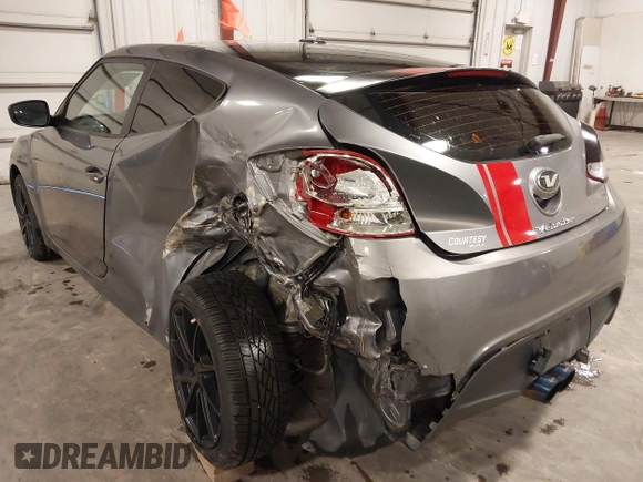 2016 Hyundai Veloster with VIN KMHTC6ADXGU272594, listed as a IAAI auction lot 42437409 with 91,620 mi miles and . Bid and sale history available at DreamBid. Image 3.