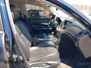 2015 Infiniti Q70 with VIN JN1BY1PP8FM601834, listed as a IAAI auction lot 42028330 with 106,285 mi miles and . Bid and sale history available at DreamBid. Image 5.