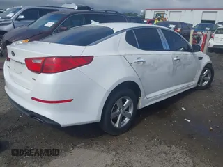 2015 Kia Optima LX z VIN 5XXGM4A73FG438282, wystawiony jako IAAI lot #42389042 z przebiegiem 228 753 mil mil oraz . Historia ofert i sprzedaży dostępna na DreamBid. Obrazek 4.