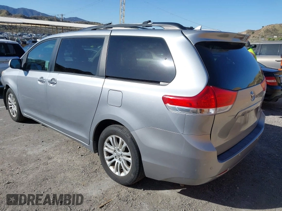 2011 Toyota Sienna XLE AAS with VIN 5TDYK3DC2BS153417, listed as a IAAI auction lot 41685324 with 158,195 mi miles. Bid and sale history available at carsss.com. Image 3.