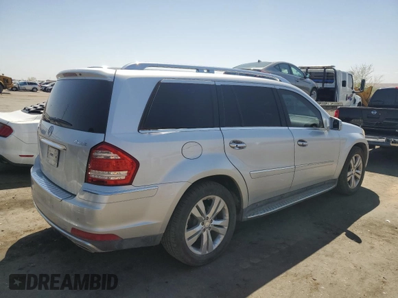 2012 Mercedes-Benz GL 450 z VIN 4JGBF7BE7CA786740, wystawiony jako Copart lot #52651335 z przebiegiem 157 028 mil mil oraz Szkoda całkowita • Salvage title. Historia ofert i sprzedaży dostępna na DreamBid. Obrazek 3.