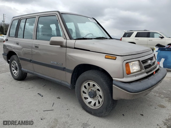 1997 Suzuki Sidekick JX with VIN 2S3TD03V4V6403519, listed as a Copart auction lot 49666085 with NaN miles and Salvage Title. Bid and sale history available at carsss.com. Image 4.