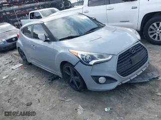2014 Hyundai Veloster Turbo with VIN KMHTC6AE7EU199478, listed as a IAAI auction lot 41772626 with 162,985 mi miles. Bid and sale history available at carsss.com. Image 1.