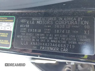2010 Kia Rio LX with VIN KNADH4A33A6668719, listed as a IAAI auction lot 41777544 with 124,400 mi miles. Bid and sale history available at carsss.com. Image 9.