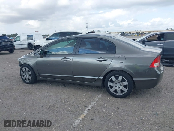 2009 Honda Civic LX z VIN 2HGFA16599H369479, wystawiony jako IAAI lot #41489267 z przebiegiem 143 297 mil mil oraz . Historia ofert i sprzedaży dostępna na DreamBid. Obrazek 14.