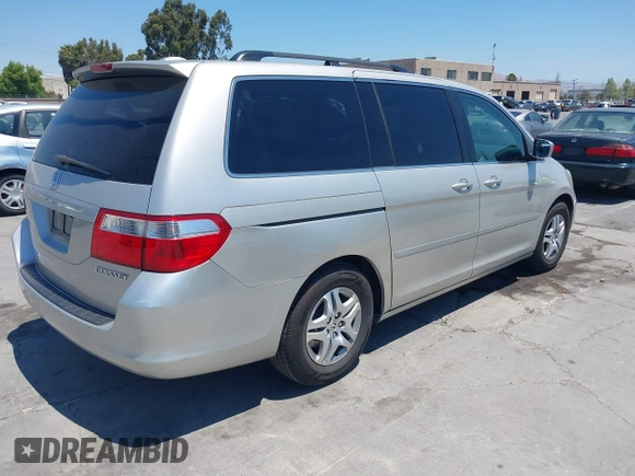 2005 Honda Odyssey EX-L with VIN 5FNRL38725B113815, listed as a IAAI auction lot 42754724 with 179,214 mi miles and . Bid and sale history available at DreamBid. Image 4.