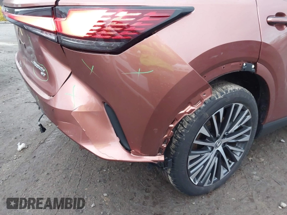 2023 Lexus RX 350h with VIN 2T2BBMCAXPC018936, listed as a IAAI auction lot 41027968 with 20,669 mi miles and . Bid and sale history available at DreamBid. Image 12.
