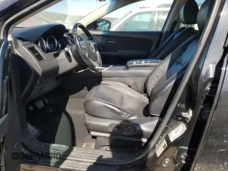2015 Mazda CX-9 Touring z VIN JM3TB2CA5F0455109, wystawiony jako Copart lot #46899815 z przebiegiem 131 847 mil mil oraz Szkoda całkowita • Salvage title. Historia ofert i sprzedaży dostępna na DreamBid. Obrazek 7.