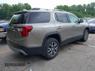 2023 GMC Acadia SLT with VIN 1GKKNUL41PZ184357, listed as a IAAI auction lot 42439400 with 60,238 mi miles and . Bid and sale history available at DreamBid. Image 4.