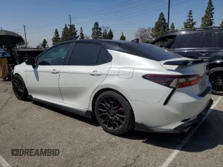 2022 Toyota Camry TRD with VIN 4T1KZ1AK0NU066094, listed as a Copart auction lot 54195355 with 48,955 mi miles and Salvage title. Bid and sale history available at DreamBid. Image 2.