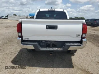 2018 Toyota Tacoma SR5 z VIN 3TMAZ5CN0JM056596, wystawiony jako Copart lot #58373385 z przebiegiem 60 798 mil mil oraz Szkoda całkowita • Salvage title. Historia ofert i sprzedaży dostępna na DreamBid. Obrazek 6.