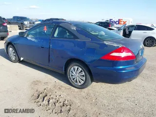 2003 Honda Accord Cpe LX with VIN 1HGCM72243A033561, listed as a IAAI auction lot 41721175 with 285,429 mi miles. Bid and sale history available at carsss.com. Image 3.