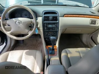 2003 Toyota Solara SE z VIN 2T1CF22P33C603259, wystawiony jako Copart lot #53045935 z przebiegiem 215 054 mil mil oraz Szkody całkowita. Historia ofert i sprzedaży dostępna na DreamBid. Obrazek 8.