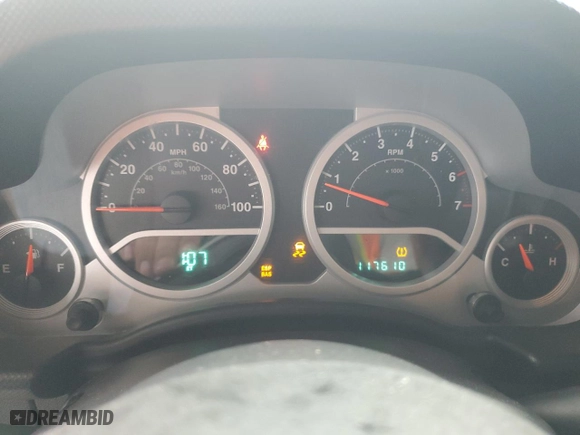 2010 Jeep Wrangler Mountain with VIN 1J4AA2D1XAL176452, listed as a Copart auction lot 72231974 with 117,610 mi miles and Salvage Title. Bid and sale history available at carsss.com. Image 9.
