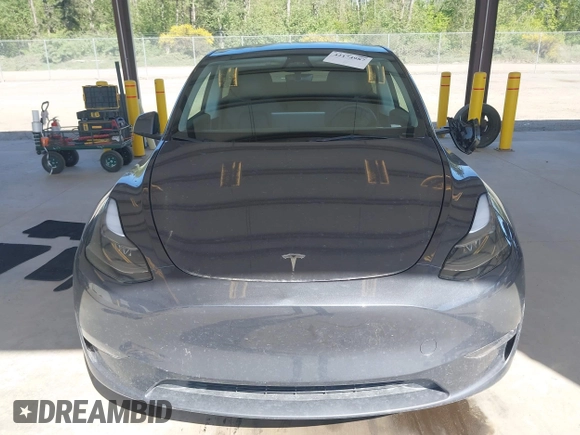 2023 Tesla Model Y Long Range with VIN 7SAYGAEE4PF906577, listed as a IAAI auction lot 42174987 with 13,260 mi miles and . Bid and sale history available at DreamBid. Image 12.