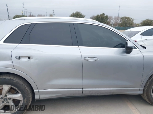 2021 Audi Q3 Premium with VIN WA1AUCF35M1066713, listed as a IAAI auction lot 41395334 with 82,724 mi miles and . Bid and sale history available at DreamBid. Image 14.