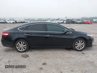 2014 Toyota Avalon Limited z VIN 4T1BK1EB3EU132555, wystawiony jako IAAI lot #41883284 z przebiegiem 263 238 mil mil oraz . Historia ofert i sprzedaży dostępna na DreamBid. Obrazek 13.