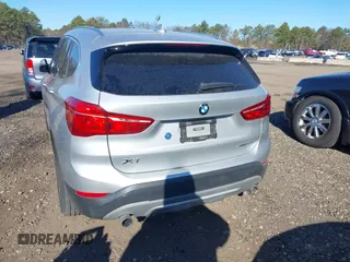 2018 BMW X1 xDrive28i with VIN WBXHT3C30J5L29757, listed as a IAAI auction lot 41879504 with 60,490 mi miles. Bid and sale history available at carsss.com. Image 16.
