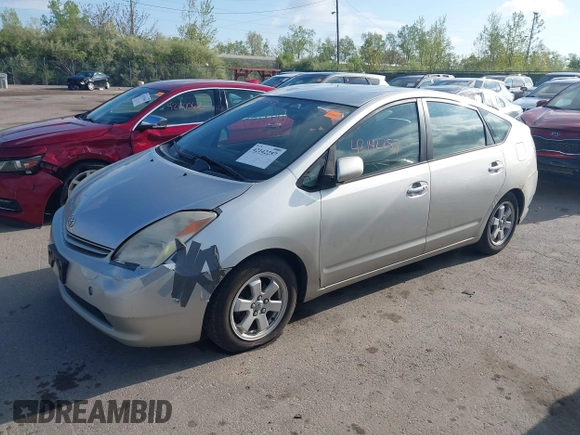 2004 Toyota Prius with VIN JTDKB20U940020058, listed as a IAAI auction lot 42142257 with 141,705 mi miles. Bid and sale history available at carsss.com. Image 2.