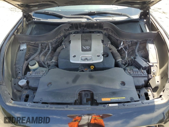 2009 Infiniti FX z VIN JNRAS18W79M153932, wystawiony jako Copart lot #52904095 z przebiegiem 170 407 mil mil oraz Szkoda całkowita • Salvage title. Historia ofert i sprzedaży dostępna na DreamBid. Obrazek 11.