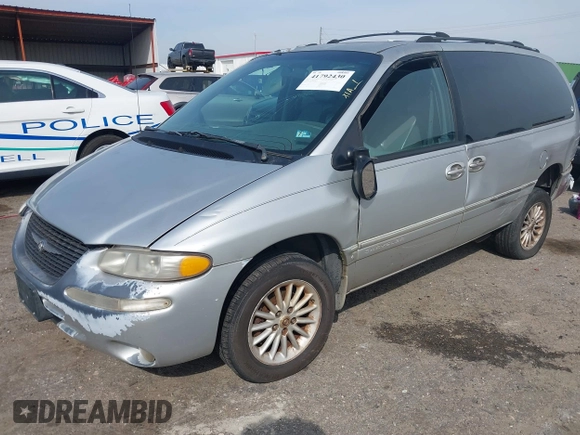 1999 Chrysler Town & Country LXi with VIN 1C4GP54L3XB899589, listed as a IAAI auction lot 41792430 with 248,850 mi miles. Bid and sale history available at carsss.com. Image 2.