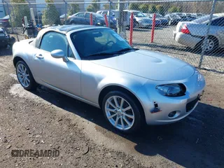 2007 Mazda MX-5 Miata Sport z VIN JM1NC25F170135777, wystawiony jako IAAI lot #41746586 z przebiegiem 107 302 mil mil oraz . Historia ofert i sprzedaży dostępna na DreamBid. Obrazek 1.