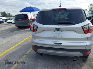 2017 Ford Escape SE with VIN 1FMCU0G90HUC81240, listed as a IAAI auction lot 40607814 with 68,333 mi miles and . Bid and sale history available at DreamBid. Image 16.
