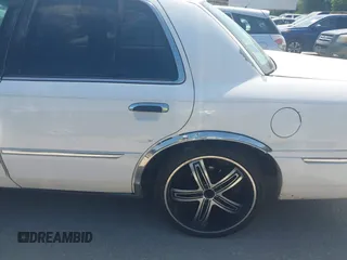 2000 Mercury Grand Marquis LS z VIN 2MEFM75W2YX731383, wystawiony jako IAAI lot #42262528 z przebiegiem 172 940 mil mil oraz . Historia ofert i sprzedaży dostępna na DreamBid. Obrazek 12.