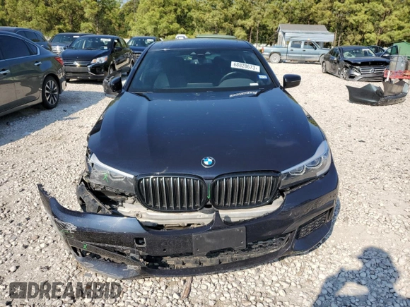 2019 BMW 7 Series 740i with VIN WBA7E2C50KB216499, listed as a Copart auction lot 68828673 with 94,549 mi miles. Bid and sale history available at carsss.com. Image 5.
