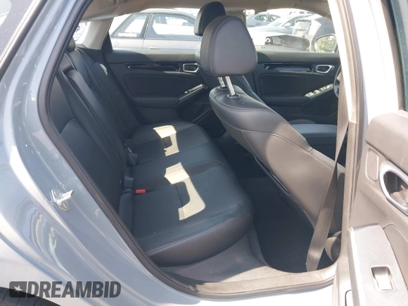 2023 Honda Civic Touring with VIN 2HGFE1F92PH322377, listed as a IAAI auction lot 42361473 with 43,533 mi miles and . Bid and sale history available at DreamBid. Image 8.