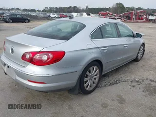 2009 Volkswagen CC Sport with VIN WVWNL73C69E548158, listed as a IAAI auction lot 41872972 with 127,468 mi miles. Bid and sale history available at carsss.com. Image 4.