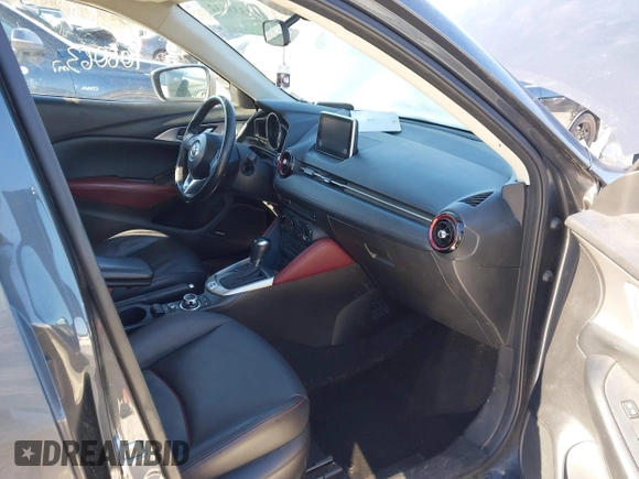 2017 Mazda CX-3 Touring with VIN JM1DKFC72H0167205, listed as a IAAI auction lot 41333632 with 106,063 mi miles. Bid and sale history available at carsss.com. Image 5.