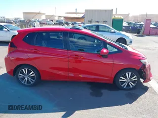2015 Honda Fit EX-L z VIN 3HGGK5H84FM761279, wystawiony jako IAAI lot #40911141 z przebiegiem 82 217 mil mil oraz . Historia ofert i sprzedaży dostępna na DreamBid. Obrazek 14.