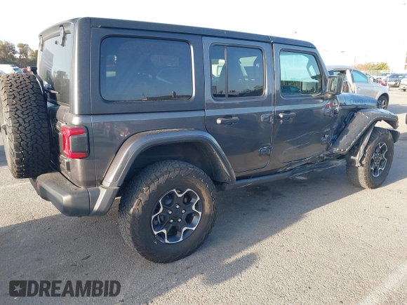 2023 Jeep Wrangler Rubicon with VIN 1C4JJXR67PW662277, listed as a IAAI auction lot 41950065 with 35,714 mi miles and . Bid and sale history available at DreamBid. Image 4.