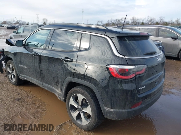 2020 Jeep Compass Latitude with VIN 3C4NJDBB1LT112676, listed as a IAAI auction lot 41651583 with 73,528 mi miles. Bid and sale history available at carsss.com. Image 3.