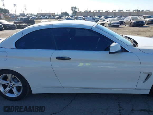 2014 BMW 4 Series 428i with VIN WBA3V7C54EP770552, listed as a IAAI auction lot 41297640 with 114,763 mi miles and . Bid and sale history available at DreamBid. Image 14.