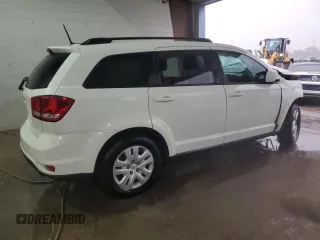 2019 Dodge Journey SE with VIN 3C4PDCBB1KT784133, listed as a Copart auction lot 49765335 with 80,954 mi miles and Salvage Title. Bid and sale history available at DreamBid. Image 3.