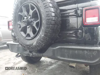 2021 Jeep Wrangler Unlimited Sport S with VIN 1C4HJXDN0MW678801, listed as a IAAI auction lot 42211815 with 96,849 mi miles and . Bid and sale history available at DreamBid. Image 17.
