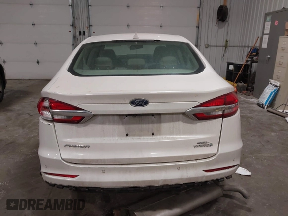 2019 Ford Fusion Hybrid SEL with VIN 3FA6P0MU8KR272811, listed as a IAAI auction lot 41705282 with 56,565 mi miles. Bid and sale history available at carsss.com. Image 16.