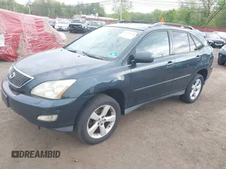 2006 Lexus RX 330 with VIN 2T2HA31U56C090677, listed as a IAAI auction lot 42182540 with 216,676 mi miles. Bid and sale history available at carsss.com. Image 2.