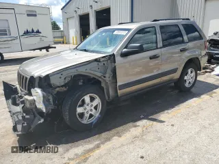 2005 Jeep Grand Cherokee Laredo with VIN 1J4HR48N65C608296, listed as a Copart auction lot 58862875 with 168,421 mi miles and Salvage title. Bid and sale history available at DreamBid. Image 1.