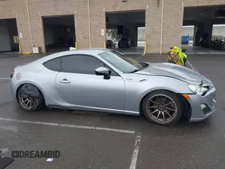 2016 Scion FR-S with VIN JF1ZNAA1XG8709798, listed as a IAAI auction lot 41713314 with 139,450 mi miles. Bid and sale history available at carsss.com. Image 14.