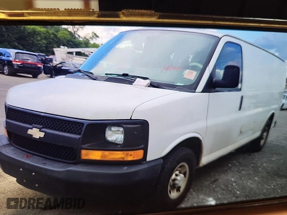 2014 Chevrolet Express Cargo with VIN 1GCWGFCG4E1148722, listed as a IAAI auction lot 42785369 with 188,945 mi miles and . Bid and sale history available at DreamBid. Image 3.
