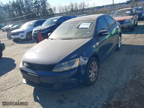2011 Volkswagen Jetta Sedan SE w/Convenience & Sunroof with VIN 3VWDX7AJ3BM321590, listed as a IAAI auction lot 41573649 with NaN miles. Bid and sale history available at carsss.com. Image 2.