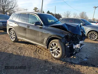 2021 BMW X5 xDrive40i with VIN 5UXCR6C0XM9H67200, listed as a IAAI auction lot 41516027 with 1 mi miles. Bid and sale history available at carsss.com. Image 1.