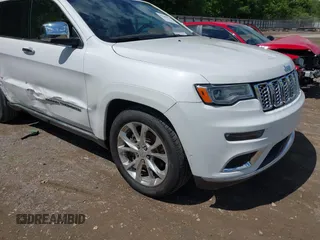 2021 Jeep Grand Cherokee Summit z VIN 1C4RJFJG1MC538391, wystawiony jako IAAI lot #42201074 z przebiegiem 98 676 mil mil oraz . Historia ofert i sprzedaży dostępna na DreamBid. Obrazek 1.